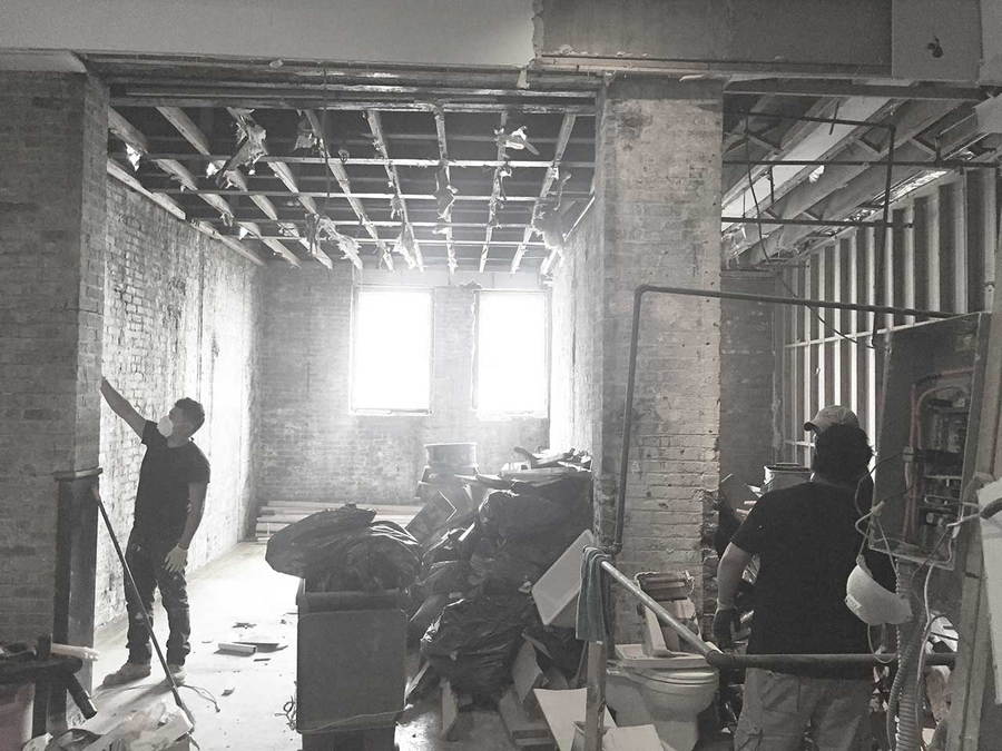 Shot of the OSSO Architecture team hard at work renovated the old space into the swank Boerum Hill Loft.