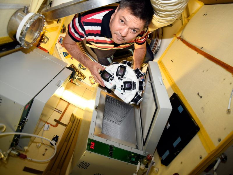 astronaut prepares lab-grown meat in space 