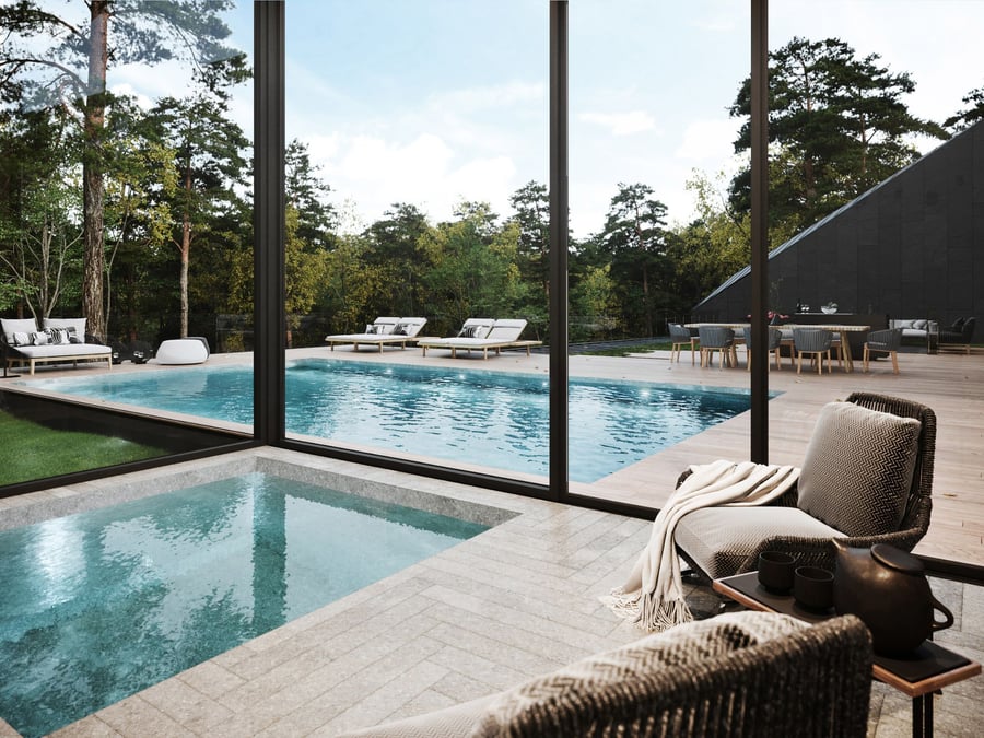 A sleek modern swimming pool graces the concrete deck outside the ultramodern Sylvan Rock home.