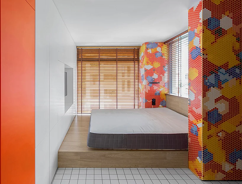 Master bedroom inside 000 Design's colorful 
