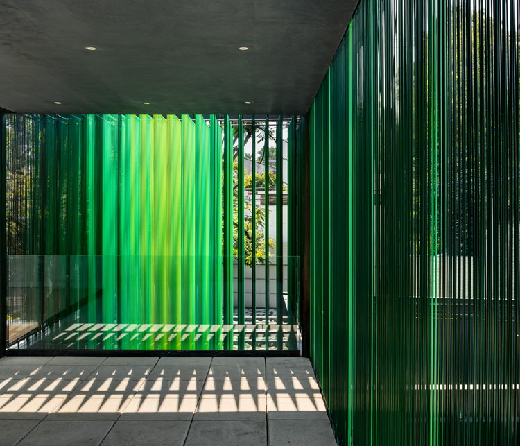 The green plastic cables that make up the facade of VITR 