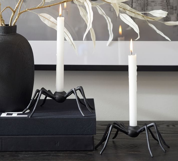 Don't be scared! Those are just spooky Pottery Barn spider candle holders, not actual creepy-crawlies!