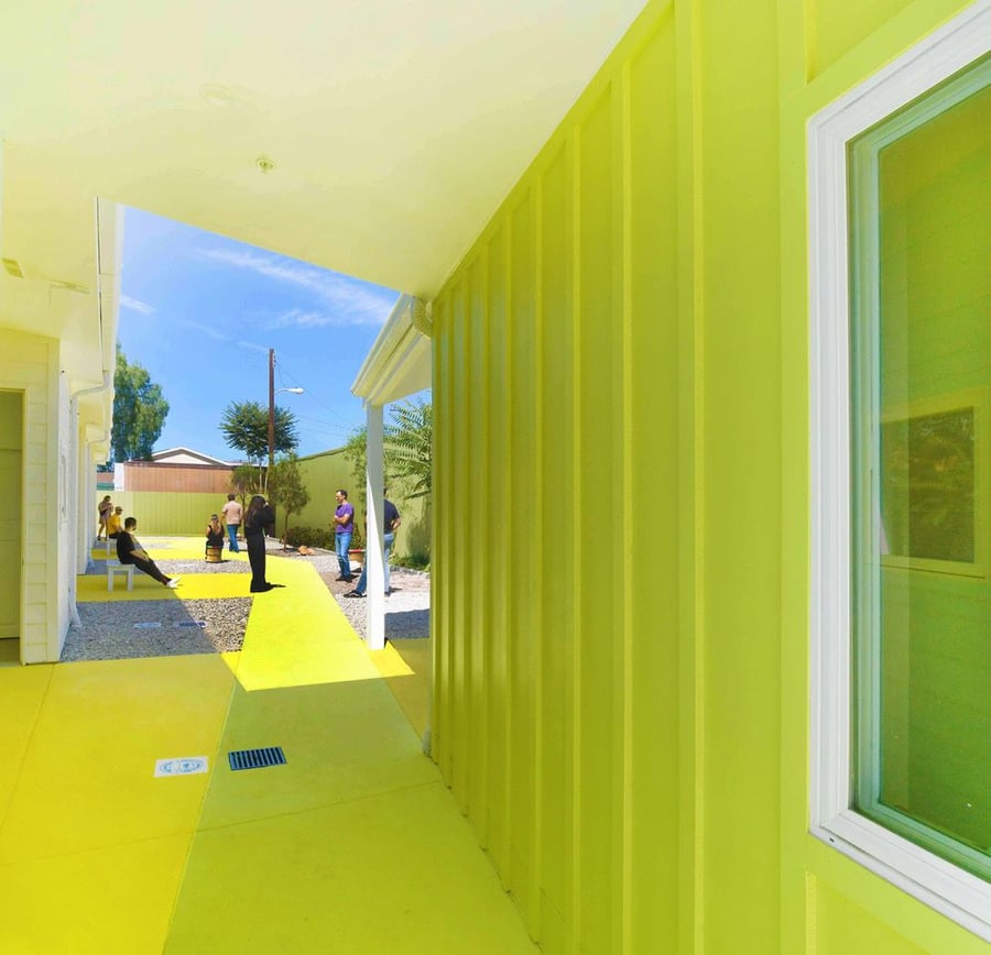Bright yellow walls and walkways liven up the Willowbrook Apartments complex.