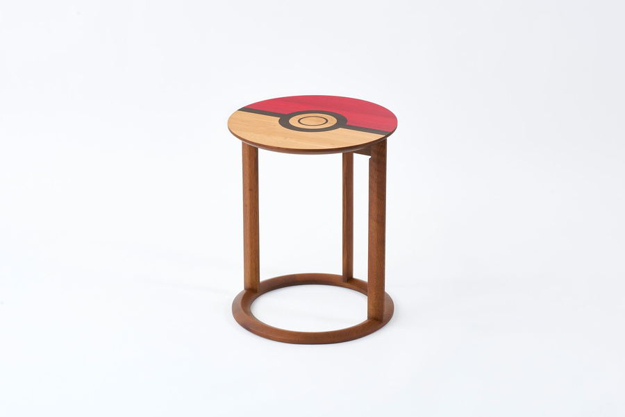 High-quality Pokéball side table featured in the Pokémon Center and Karimoku's new themed furniture collection.