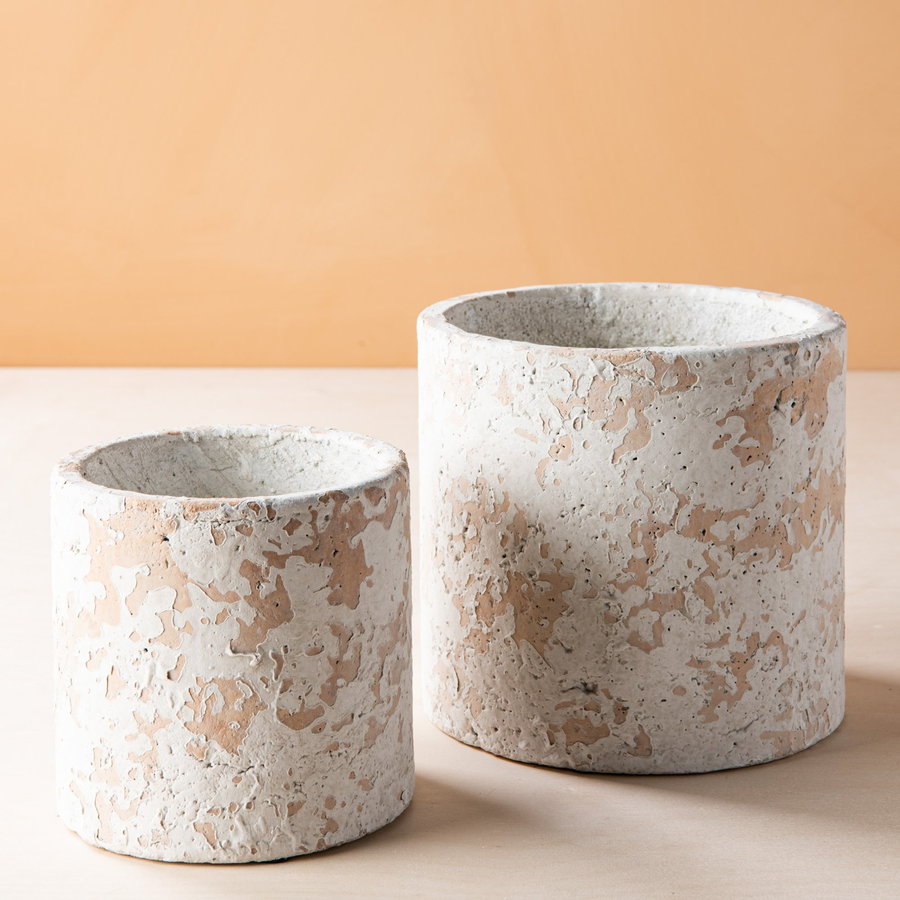 The sparse Distressed Cement Planter featured in Magnolia's new fall furniture collection.