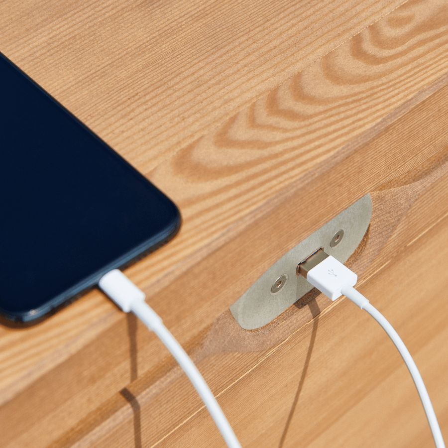 HELLO WOOD builds USB ports into all their smart public furniture pieces 