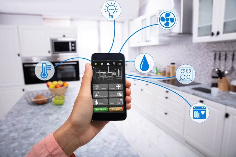 Smart kitchen appliances all connect to homeowner's smartphone.