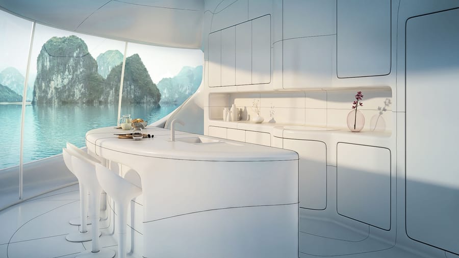 Minimalist kitchen space inside a SeaPod facing gorgeous views of the water. 