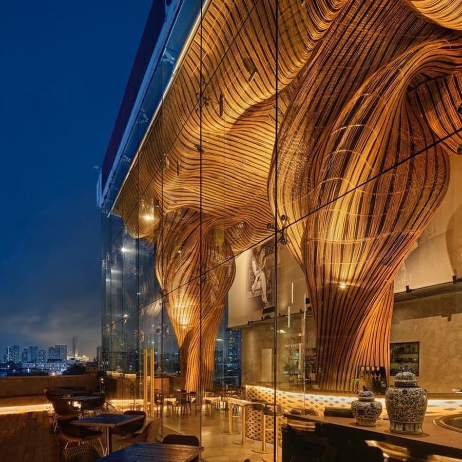 Exterior view inside the Spice & Barley restaurant, which makes extensive use of rattan for super cool dramatic effect.