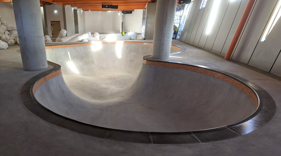 Large concrete skating bowls inside the F51 multi-story skate park.