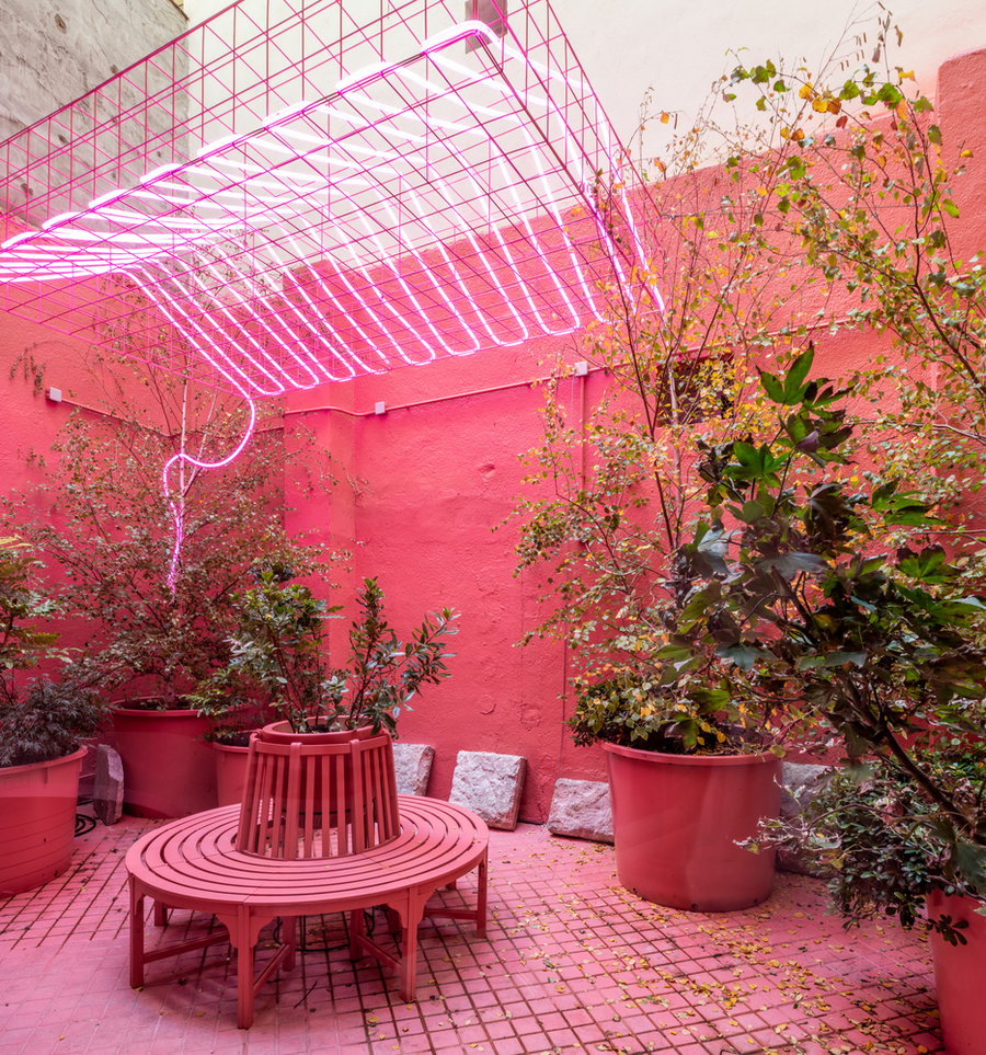 Colorful pink outdoor area gives off a vibrant emotion.