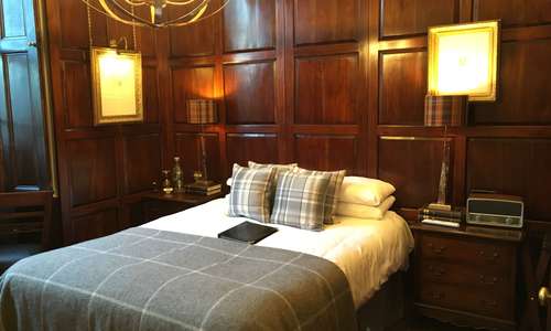Deluxe Tudor room boasting Tudor paneled walls, solid mahogany bed and furniture, Smart tvs dab Bluetooth radio and much more Deluxe Tudor room boasting Tudor paneled walls, solid mahogany bed and furniture, Smart tvs dab Bluetooth radio and much more