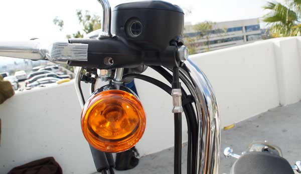 Sportster turn signal on handlebar