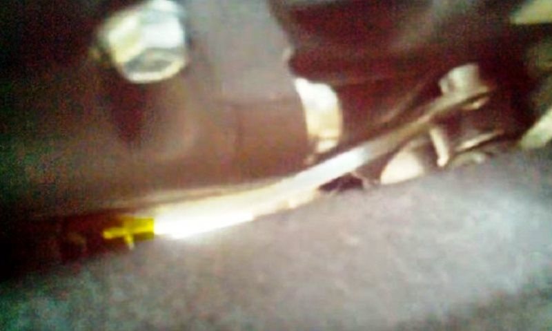 Start cutting the shifter rod at the mark indicated in the picture