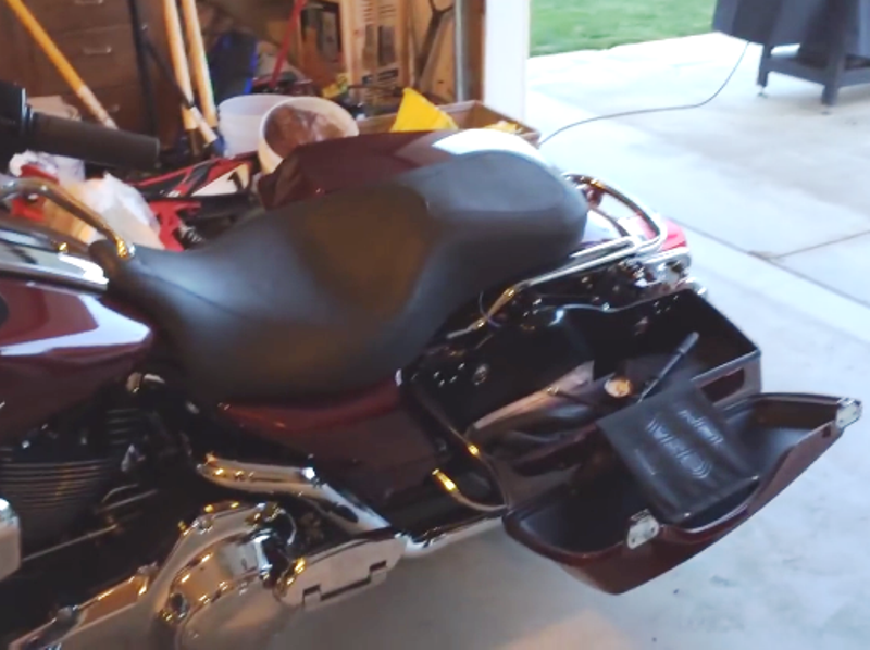 Opening saddlebag to access Schrader valve