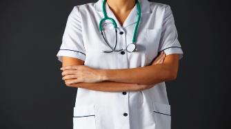 A nurse in traditional whites.
