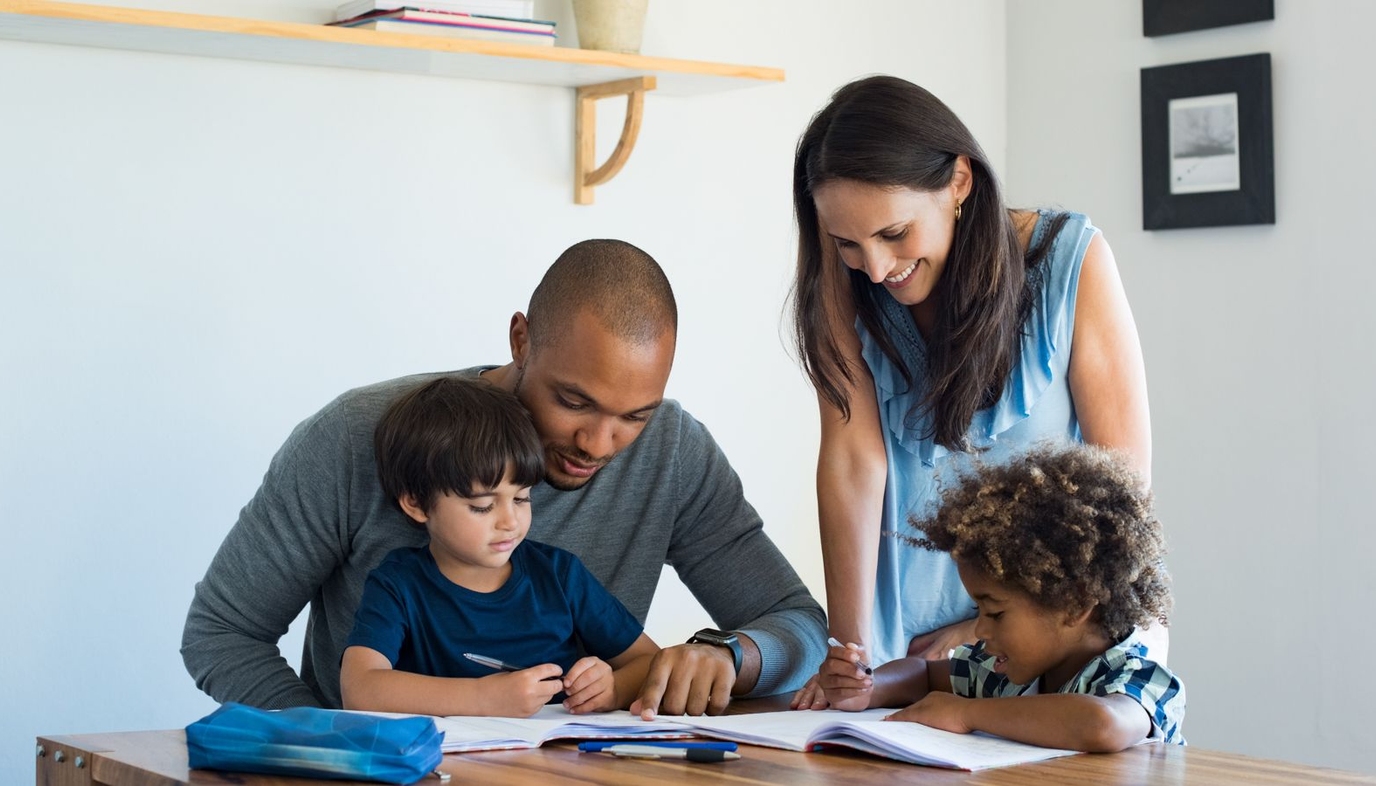 family doing homework together