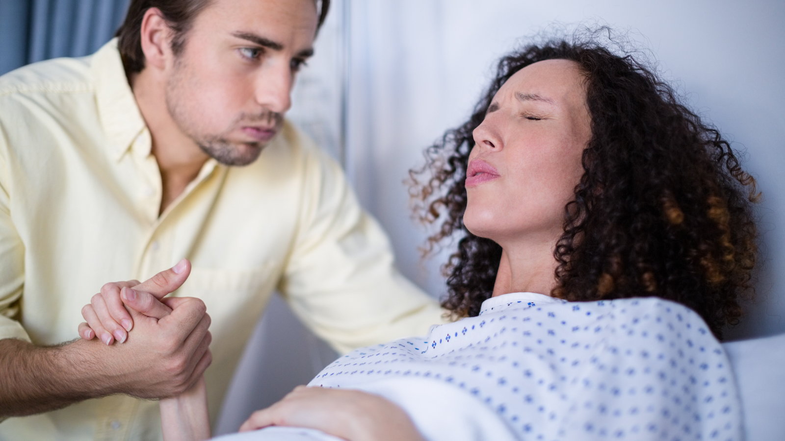 woman using lamaze breathing during birth
