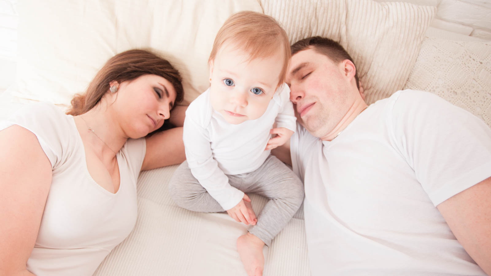 tired parents with toddler