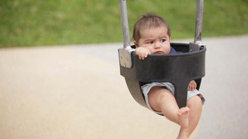 baby in swing