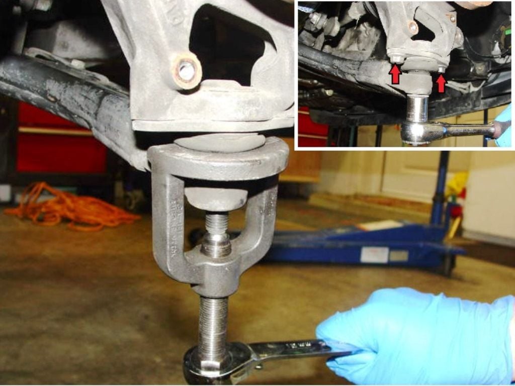 Remove the bolts and press the ball joint out of the LCA