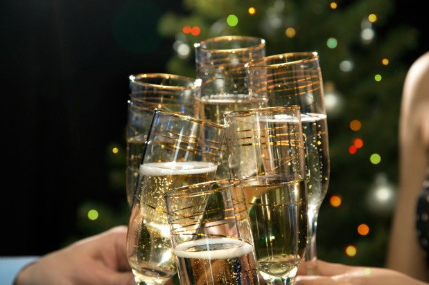 close up shot of people toasting with champagne