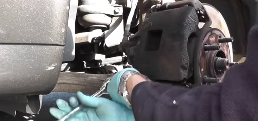 Removing brake caliper
