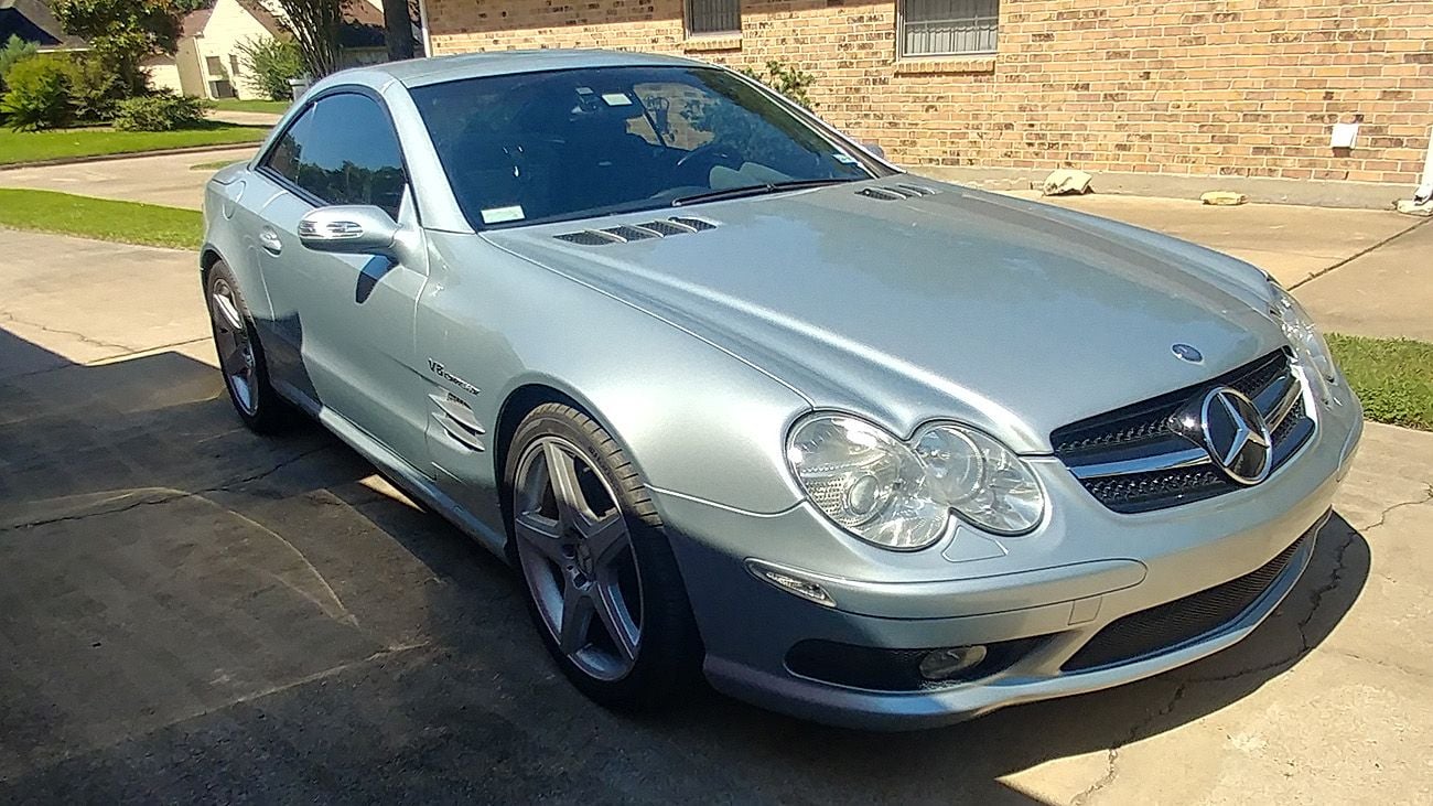 2004 Mercedes-Benz SL55 AMG - Clean MB SL55 AMG for sale (girl not included at this price) - Used - VIN WDBSK74F94F075534 - 70,549 Miles - 8 cyl - 2WD - Automatic - Convertible - Silver - Houston, TX 77084, United States
