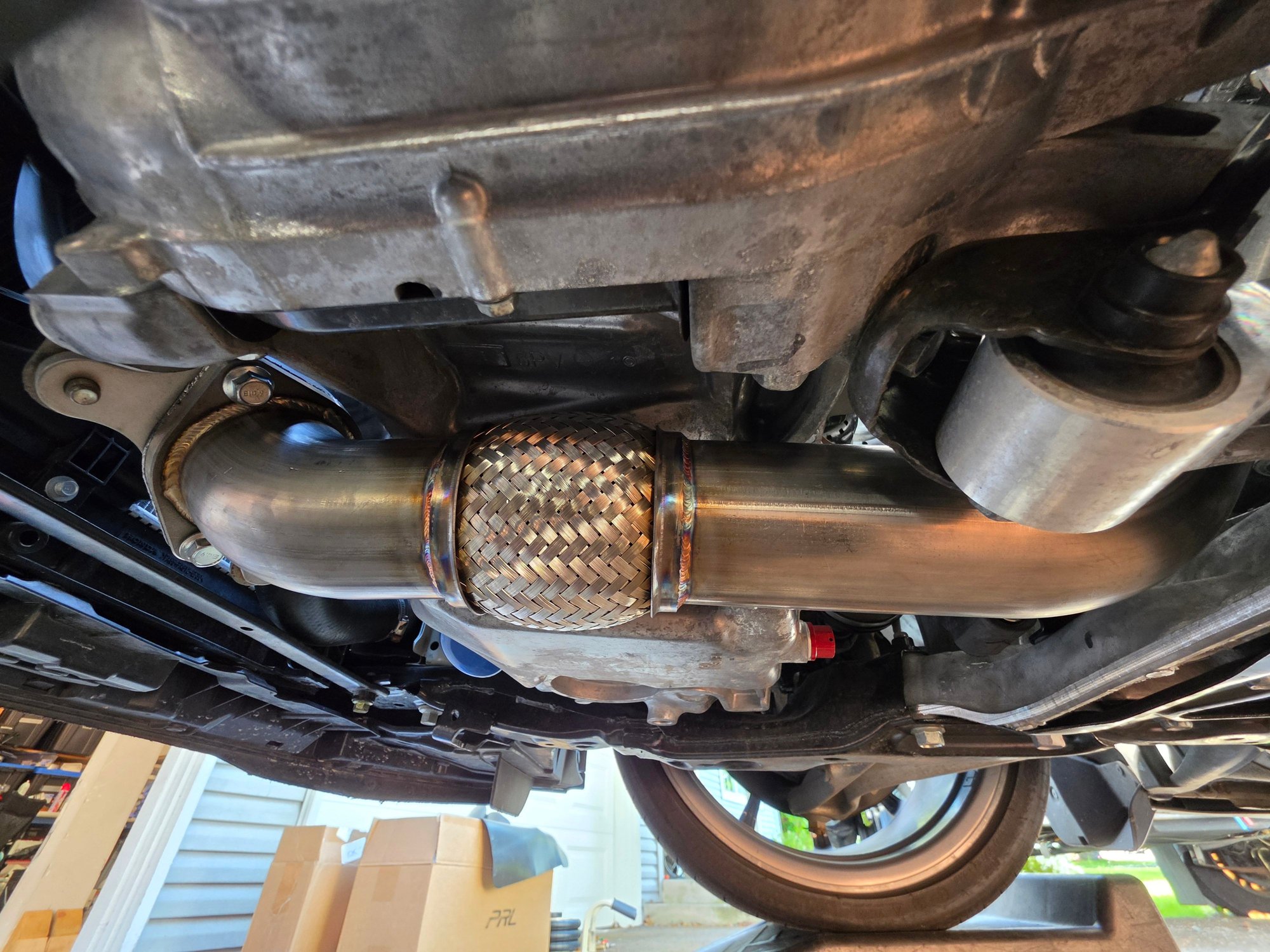 Front pipe installed. Took a bit of snaking it through, but it came out and back in ok.