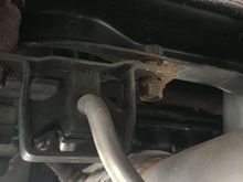 Loose Exhaust hanger bolt by the header down pipe 