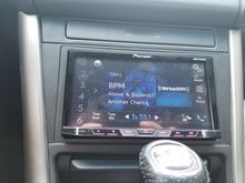Wound up going with this Pioneer AVH series cd/dvd deck with sirius and pioneer appradio which works nicely with waze. All in all I'm pretty satisfied but for some reason theres a hum from the acceleration of the car that gets louder as I go faster. Bringing it back tomorrkw to get checked but does anyone here have any siggestions? Left everything else stock for now just replaced the head unit..