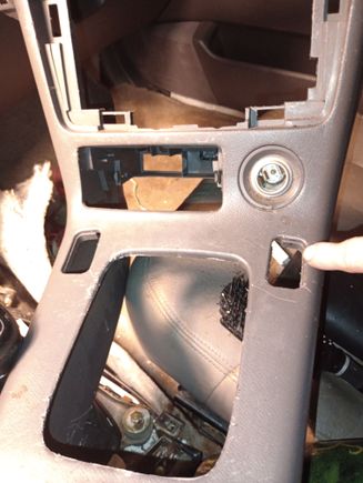 And it came from this slot here that I'm pointing at on the right side of the gear shift below the ladder