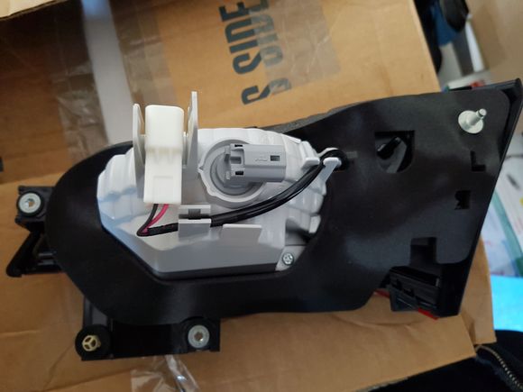 Newer Version - Center taillight (Rear) Grey connector is for the reverse light, the white one is to run the LED
