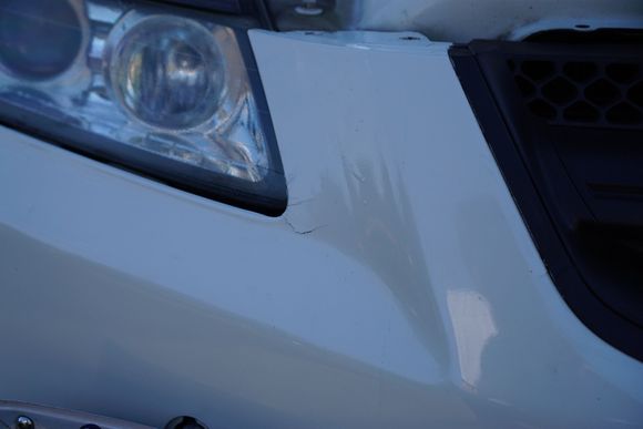 Buffing the tire marks away, this is the real major damage... it’s cracked all the way to other side and the paint is “spiderwebbing”? Across the front of the bumper. I was quoted 800 to repair the bumper and repaint or I could pay around 300-400 to get a new bumper repainted.

Fast forward to today, I picked up a type s front bumper face from the dealer for $200 and dropped it off to the shop who repainted my bumper from the first incident. I got an eta of Wednesday until they’re done with it