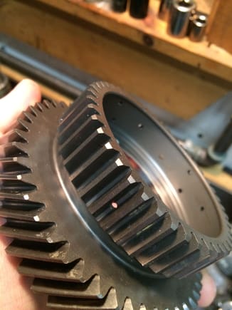 4th gear has residue of 5th gear friction material that settled down into teeth of 4th gear.