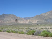 Those buildings are a geothermal power plant, and the arrow points to our approximate camp site. This is Dixie Valley, and is a great place to ride.                                                    