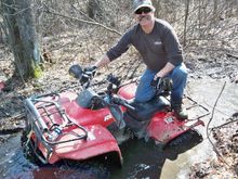 uncle pat stuck in a mud hole... can-am to the rescue!