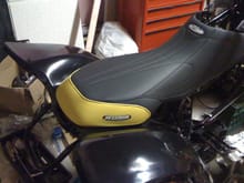 Jettrim custom seat cover. Top notch quality. There is actually 3 different black materials on this puppy.                                                                                              