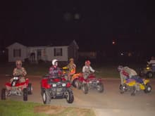 My wife on her Prairie 300, Brother on his 250ex, Friend on his 300ex, sister riding a badger 80. April 18, 03