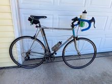  I recently tinkered with her and ditched the DP brakes and aero profile clincher for some more correct tubular rims, albeit on Campanutella 8spd hubs.  I think it looks much better.   