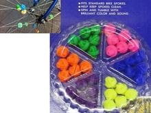They slide up and down the spokes.  
