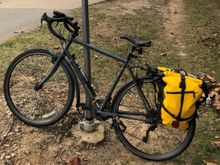 Normal commute mode.  I can carry 2 bags of groceries in panniers and carry mesh net and bungee cords to carry bulky items (e.g. toilet paper) on top of the rack.