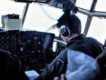 No locks on these cockpit doors, just walk right in. Gosh, the pilot's using a paper map to find the way out of Antarctica! ...