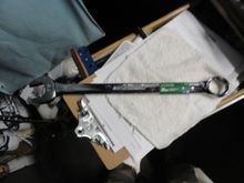 A 36mm combination wrench from a local big box store.  Cost was $20 before any discounts or rebates.  It is 20" long and gives plenty of leverage.  More than my VAR tool that only has  six inches of leverage.