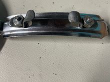 Those tabs fit over the saddle rails 