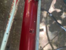A cable guide on the top tube is broken 
