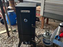 Chickens in the smoker yesterday with cheap cold beer.