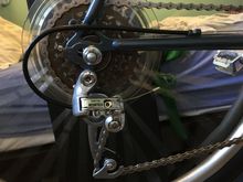 Derailleur and chain when on largest sprocket and smallest chainring