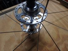Using a spoke to locate the correct NDS spoke hole that most closely follows our first spoke on the drive side.