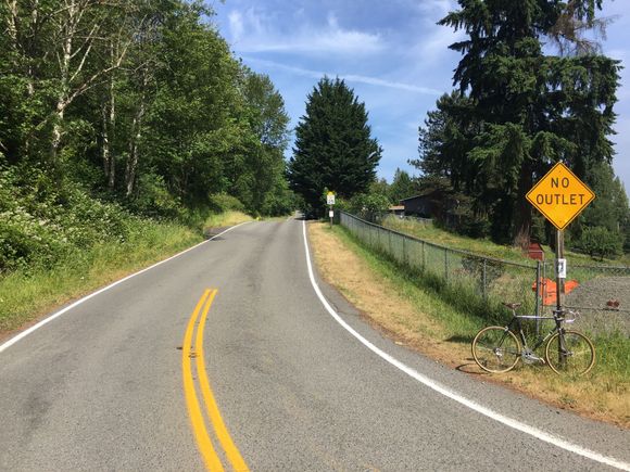 This straight section starting my final drag home is about 0.5km - Nicknamed the ‘3 hump bump-up’.  Between the anaerobic Bump-Ups, I can barely recover enough in a 34-26 gear to not stop.  At the top go left and climb some more.  No Outlet, Do It.